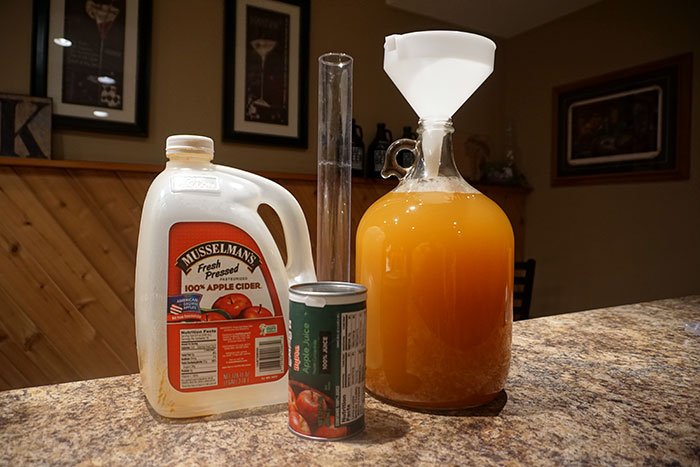 a gallon of apple cider and a can of apple juice concentrate to add sugar to the cider