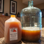 a one gallon jug of fresh pressed apple orchard cider